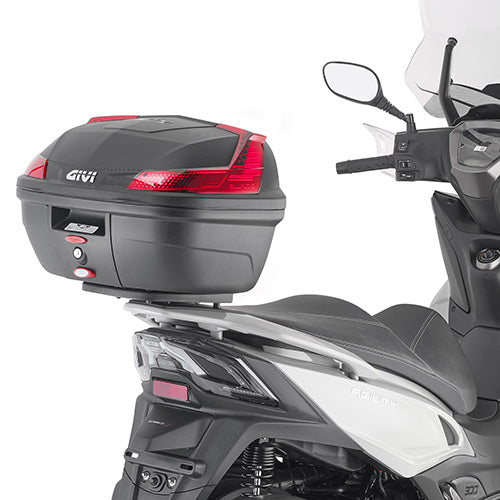 Scooter with a Givi top box on a white background