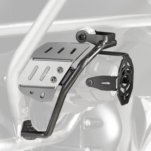 Metal spotlight guard on a motorcycle with a white background